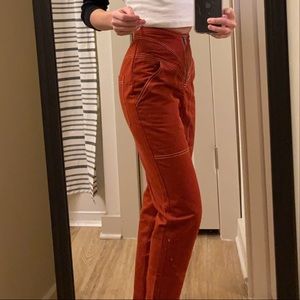 Never worn rust/red front zip unique pants!